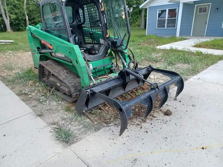 Grapple work on a cleared lot