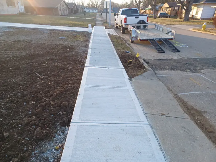 New sidewalk and approach